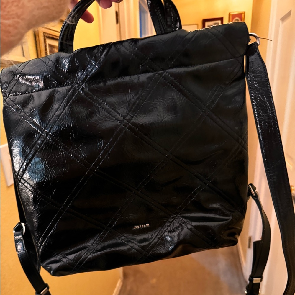 black shiny backpack / purse. magnet close top